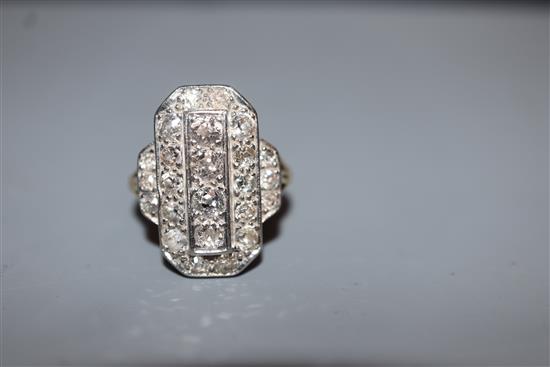 A mid 20th century Art Deco style yellow metal and plat, diamond cluster tablet ring, size K.